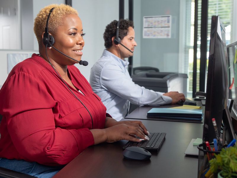 two workers in a call center